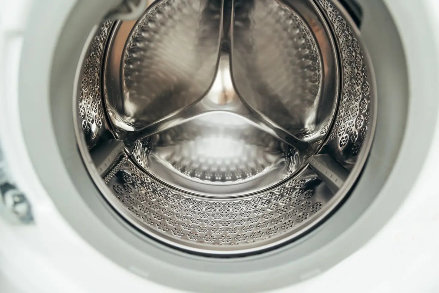 Close-up of a washing machine control panel and dial